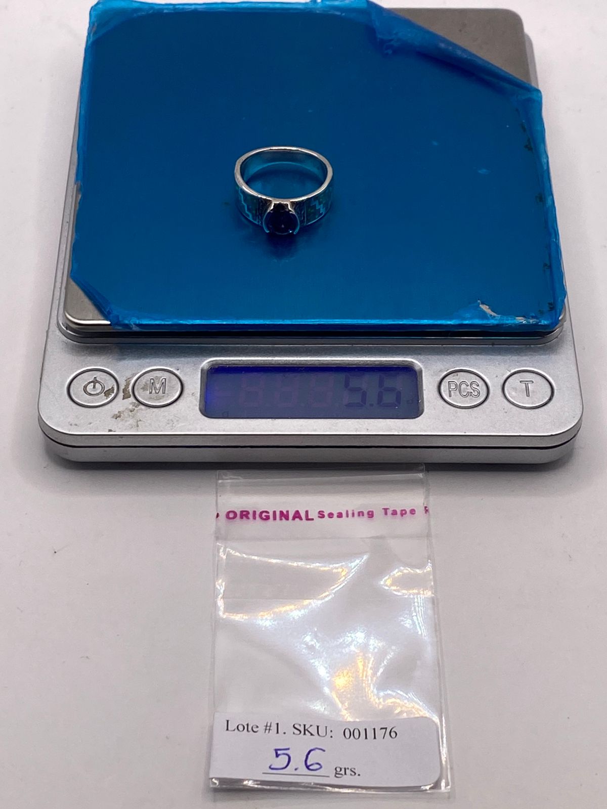 Anillo Greca de Plata 950 con Ópalo de Fuego y Zirconia, peso en gramos (báscula)