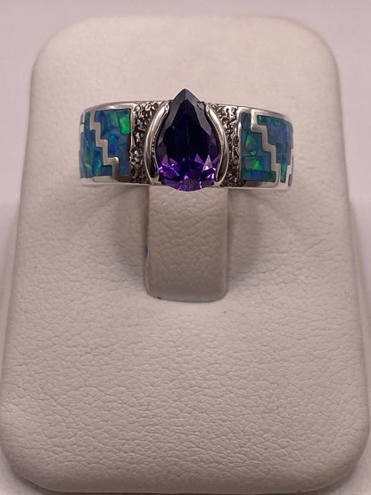 Anillo Greca de Plata 950 con Ópalo de Fuego y Zirconia, vista lateral