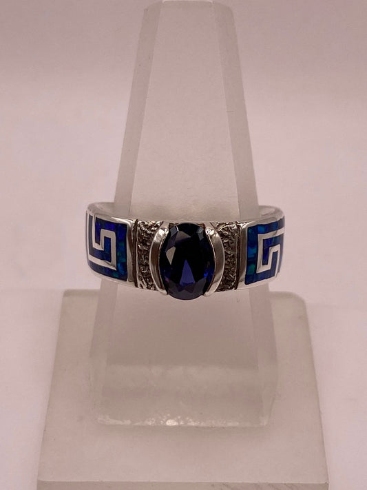 Anillo con Greca Geométrica, Ópalo de Fuego y Zirconia en Plata .950 — ángulo diagonal