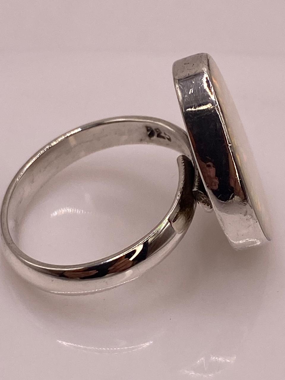 Anillo Minimalista Ajustable con Ópalo de Fuego en Plata .925, sello de autenticidad Plata Ley .925