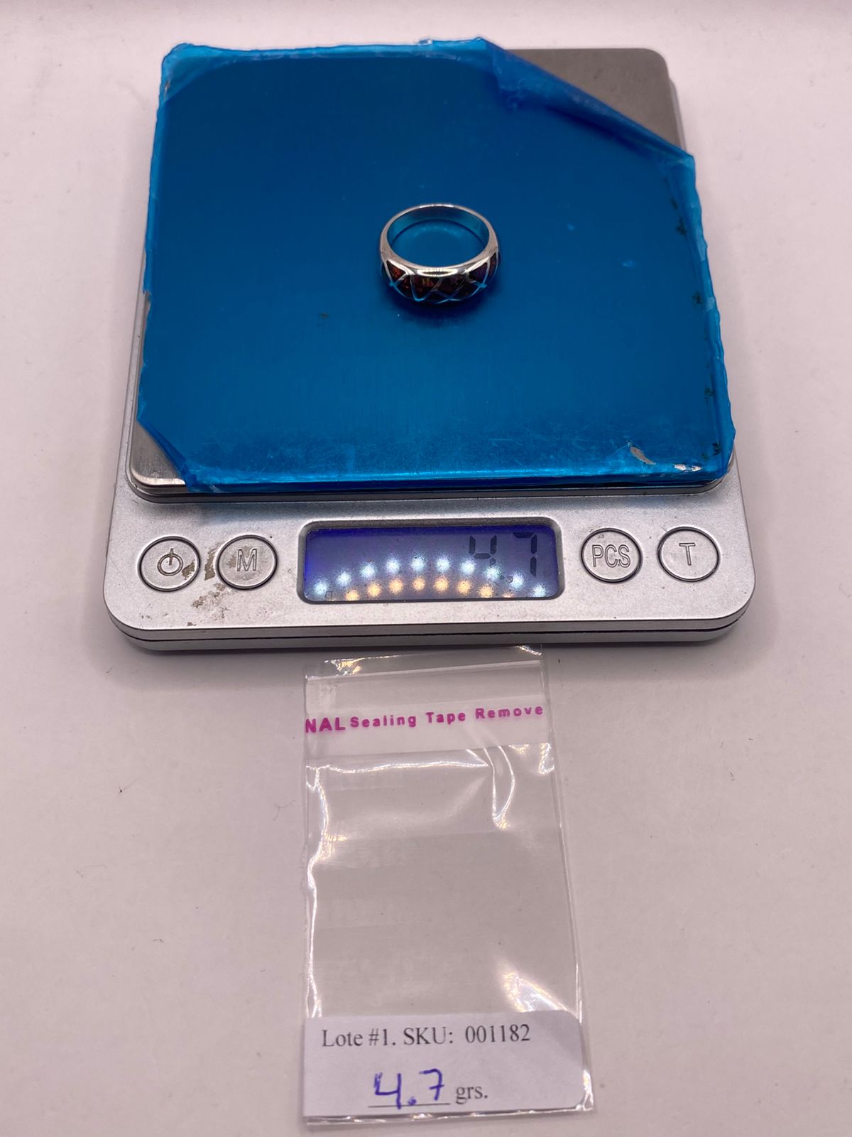 Anillo Moderno Geométrico de Plata 950 con Ópalo de Fuego, peso en gramos (báscula)