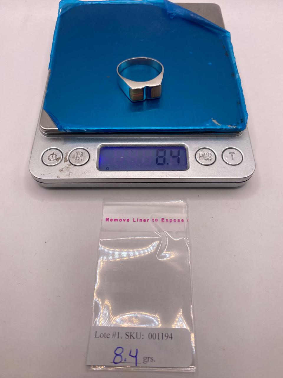 Anillo Moderno Geométrico de Plata 950 con Ópalo de Fuego, peso en gramos (báscula)