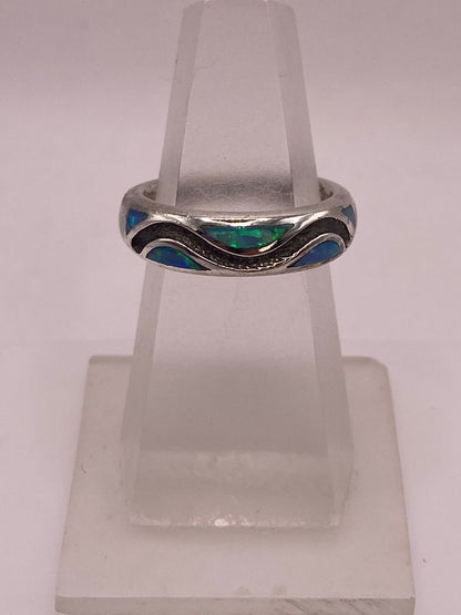 Anillo Moderno Ondulado de Plata 950 con Ópalo de Fuego, sello de autenticidad Plata Ley .925