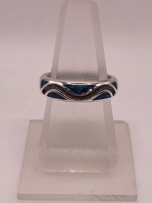 Anillo Moderno Ondulado de Plata 950 con Ópalo de Fuego — ángulo diagonal