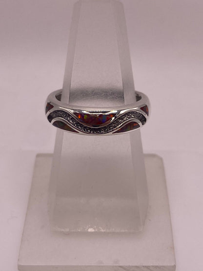 Anillo Moderno Ondulado de Plata 950 con Ópalo de Fuego, vista lateral