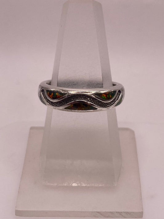 Anillo Moderno Ondulado de Plata 950 con Ópalo de Fuego — ángulo diagonal