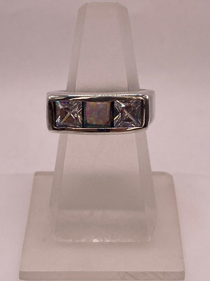 Anillo Moderno con Ópalo de Fuego y Circonias en Plata .925, vista lateral