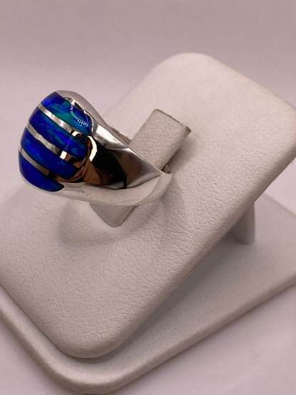 Anillo Moderno en Plata Ley 925 con Ópalo de Fuego Azul, sello de autenticidad Plata Ley .925