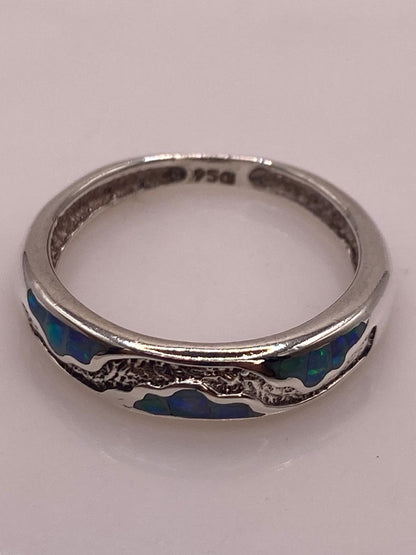 Anillo Ondulado de Plata 950 con Ópalo de Fuego, sello de autenticidad Plata Ley .925