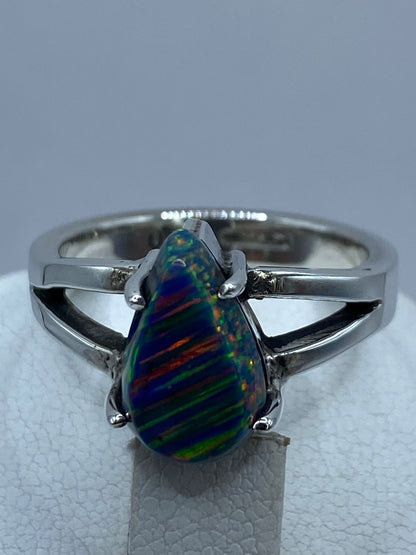 Anillo de Ópalo de Fuego Azul Multicolor en Plata .925 Diseño Moderno Elegante, sello de autenticidad Plata Ley .925