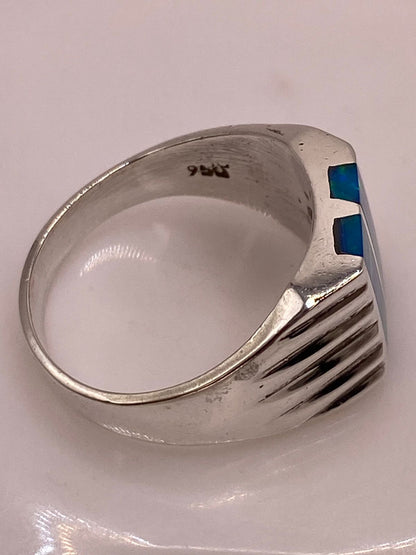 Anillo con Ópalo de Fuego Azul‑verde en Barras en Plata .950, sello de autenticidad Plata Ley .925