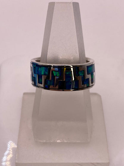 Anillo de Ópalo de Fuego Azul‑Verde con Diseño Geométrico en Plata Ley 950, vista lateral