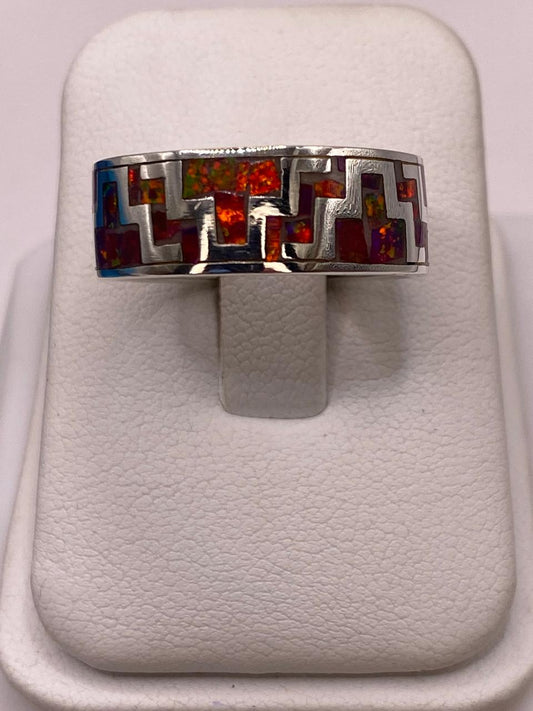 Anillo de Ópalo de Fuego con Diseño Geométrico en Plata Ley 950 — detalle de acabado