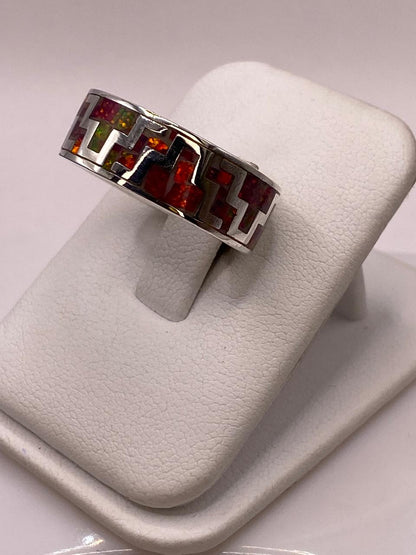 Anillo de Ópalo de Fuego con Diseño Geométrico en Plata Ley 950, vista frontal