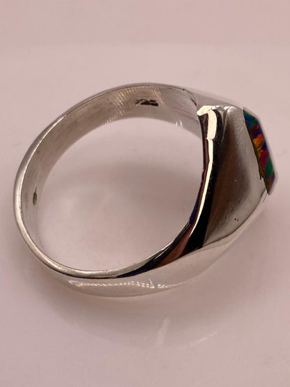 Anillo con Ópalo de Fuego Multicolor en Rombo, sello de autenticidad Plata Ley .925