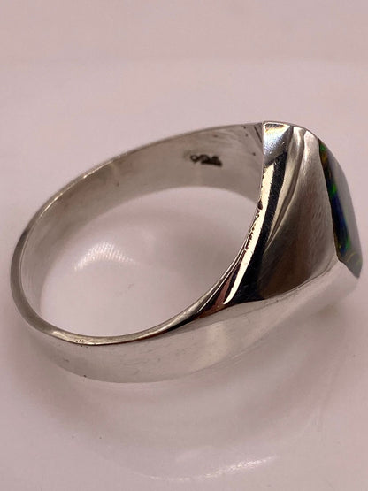 Anillo con Ópalo de Fuego Multicolor en Rombo, sello de autenticidad Plata Ley .925