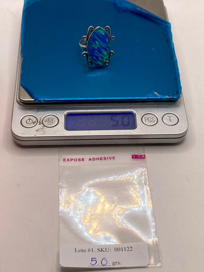 Anillo Ovalado Ajustable con Ópalo de Fuego en Plata .925, peso en gramos (báscula)
