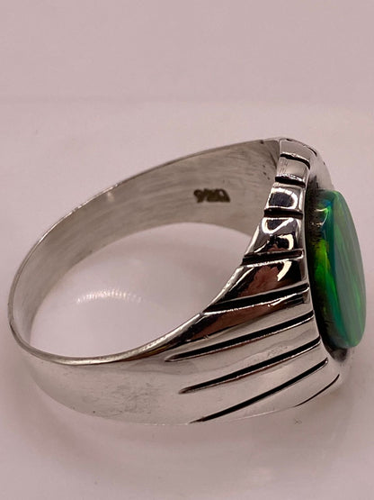 Anillo Ovalado con Diseño Contemporáneo Plata Ley 950 con Ópalo de Fuego, sello de autenticidad Plata Ley .925