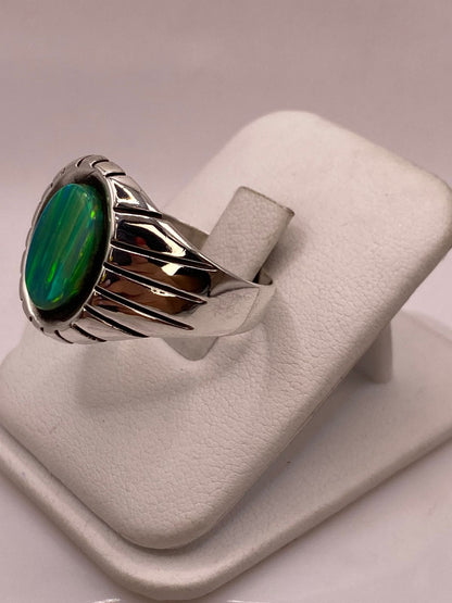 Anillo Ovalado con Diseño Contemporáneo Plata Ley 950 con Ópalo de Fuego, vista lateral