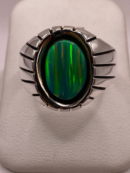 Anillo Ovalado con Diseño Contemporáneo Plata Ley 950 con Ópalo de Fuego en báscula mostrando peso