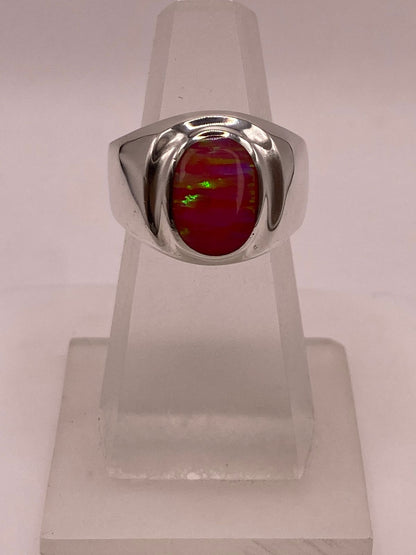 Anillo Ovalado Plata Ley 925 con Piedra Ópalo de Fuego en báscula mostrando peso