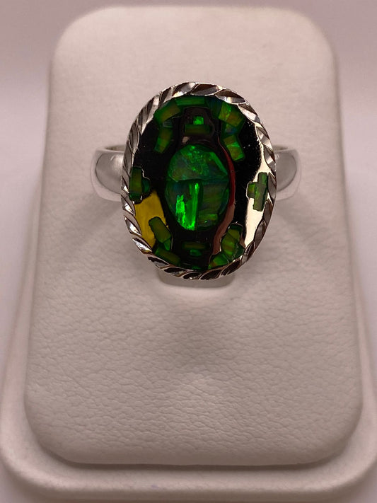 Anillo Ovalado Plata Ley 950 con Ópalo de Fuego en báscula mostrando peso