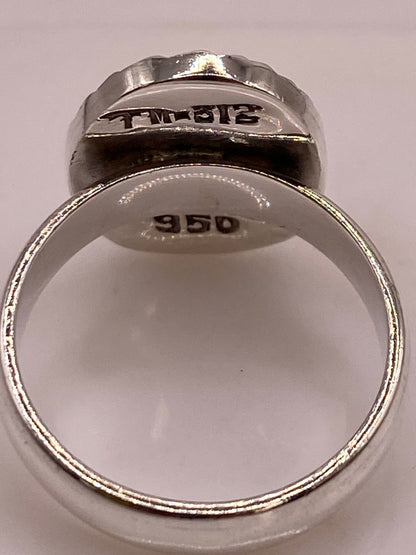 Anillo Ovalado Plata Ley 950 con Ópalo de Fuego, sello de autenticidad Plata Ley .925
