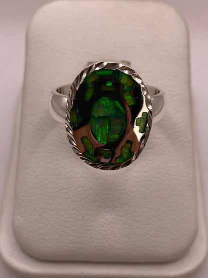 Anillo Ovalado Plata Ley 950 con Ópalo de Fuego, vista lateral
