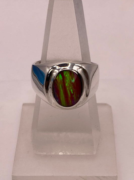 Anillo con Piedra Ópalo de Fuego Ovalada Rosa‑verde‑amarillo en Plata Ley 925 — ángulo diagonal
