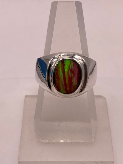 Anillo con Piedra Ópalo de Fuego Ovalada Rosa‑verde‑amarillo en Plata Ley 925, vista lateral