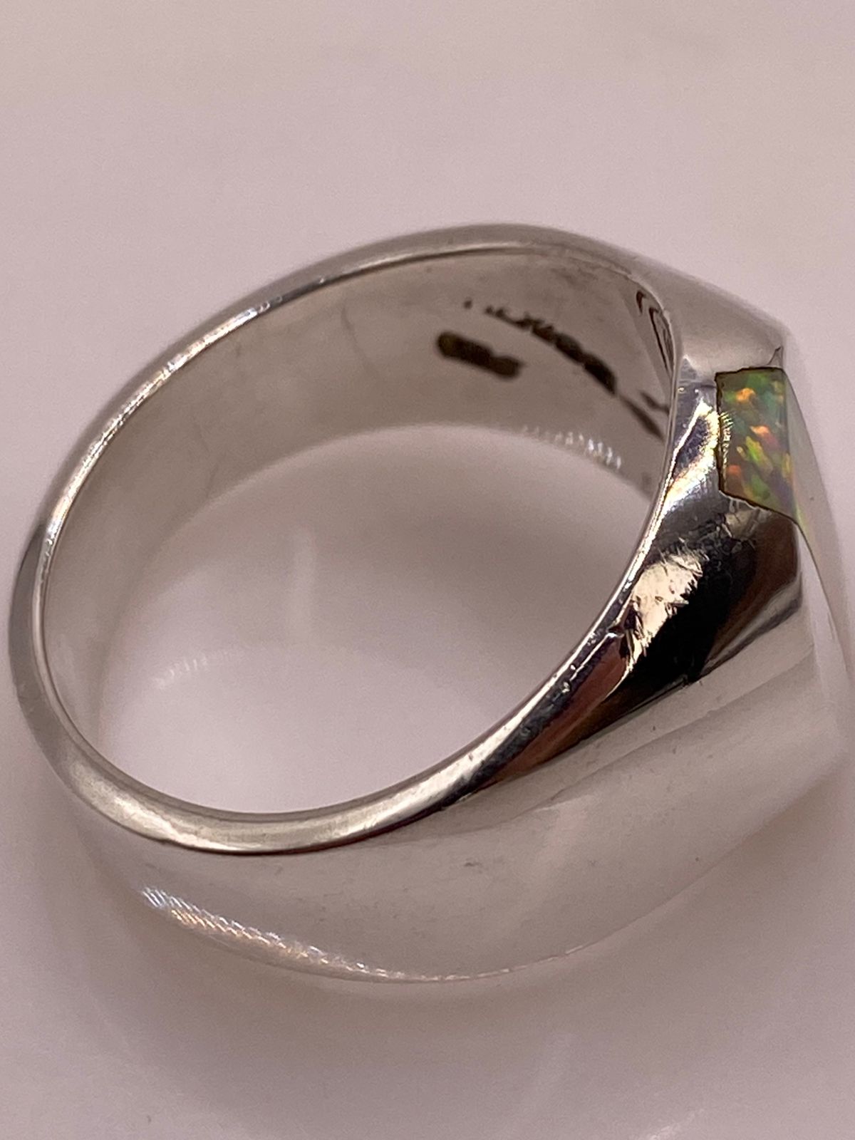 Anillo con Piedra Ópalo de Fuego en Plata Ley 950, sello de autenticidad Plata Ley .925