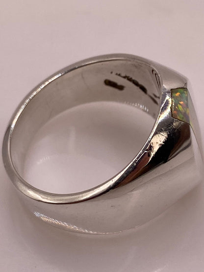 Anillo con Piedra Ópalo de Fuego en Plata Ley 950, sello de autenticidad Plata Ley .925