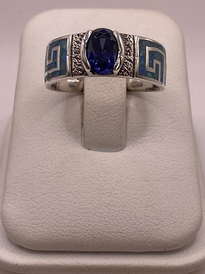 Anillo de Plata 950 con Ópalo de Fuego y Zirconia Azul, vista frontal