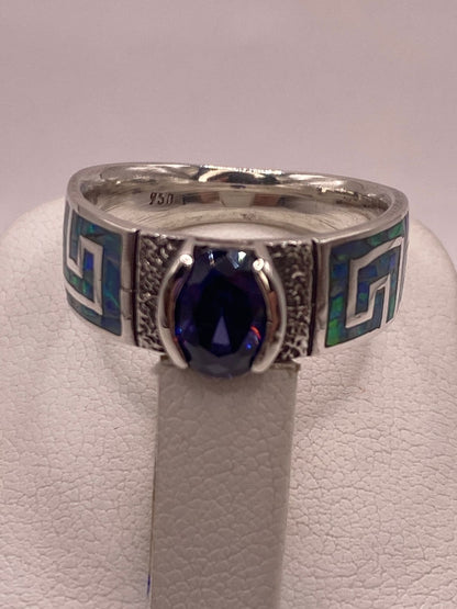 Anillo de Plata 950 con Ópalo de Fuego y Zirconia Azul, sello de autenticidad Plata Ley .925