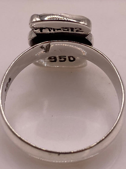 Anillo de Plata Ley 950 con Ópalo de Fuego y Diseño de Cruz, sello de autenticidad Plata Ley .925