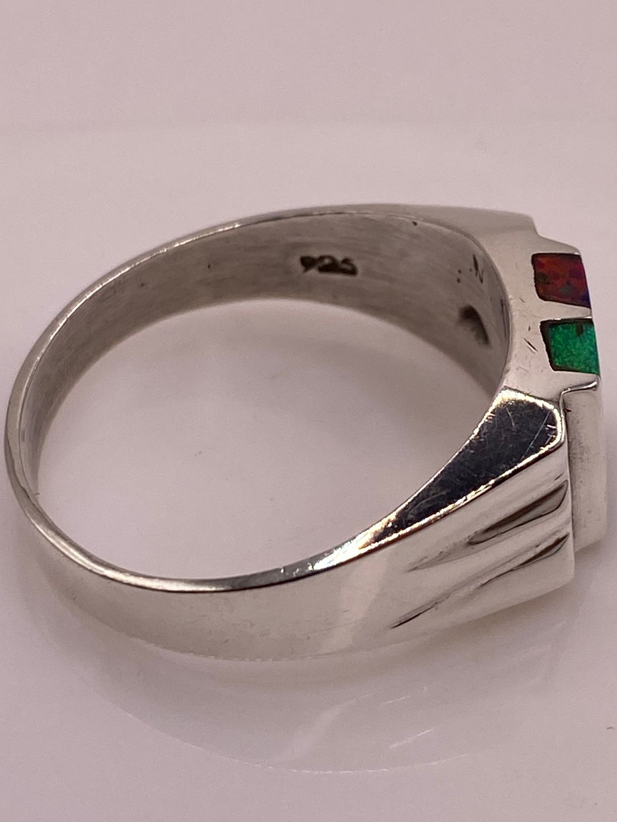 Anillo en Plata Ley 925 con Doble Incrustación de Ópalo de Fuego, sello de autenticidad Plata Ley .925