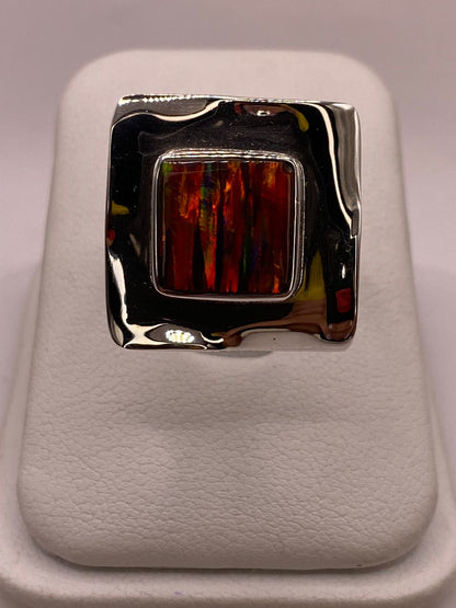 Anillo Plata Ley 925 con Ópalo de Fuego Montura Cuadrada Moderna, vista lateral