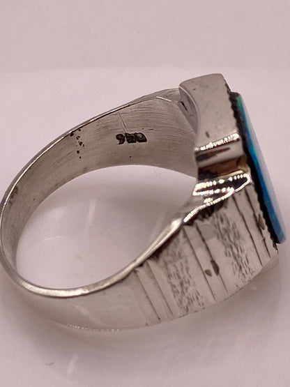 Anillo Plata Ley 950 con Ópalo de Fuego Azul‑verde Montura Ovalada Artesanal, sello de autenticidad Plata Ley .925