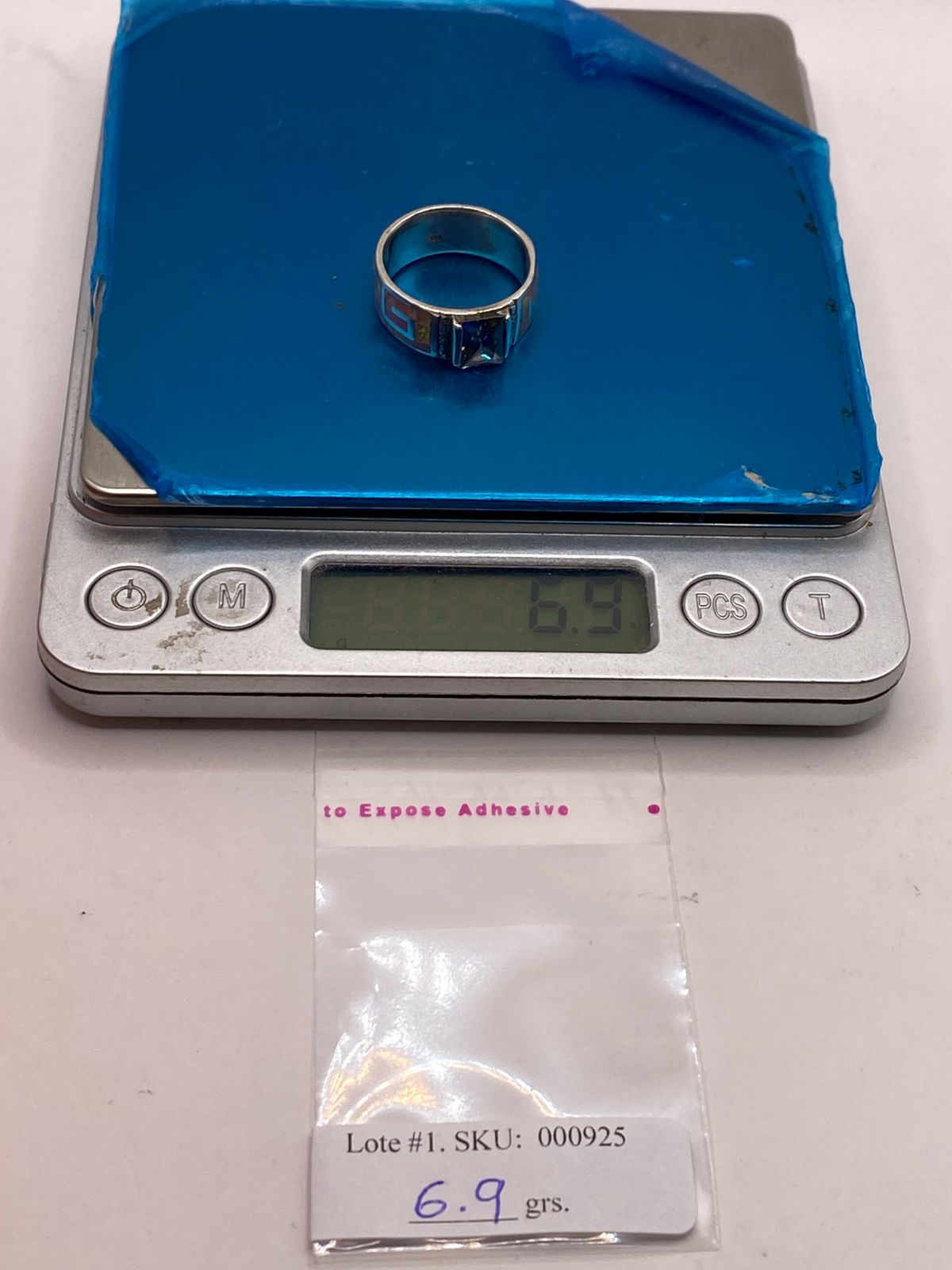 Anillo Plata Ley 950 con Ópalo de Fuego y Circonia Multicolor Diseño Greca, peso en gramos (báscula)