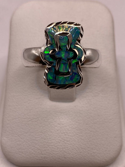 Anillo en Plata Ley 950 con Ópalo de Fuego Diseño con Figura de Cruz en báscula mostrando peso