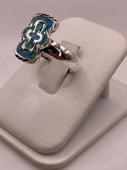 Anillo en Plata Ley 950 con Ópalo de Fuego Diseño con Figura de Cruz, vista lateral