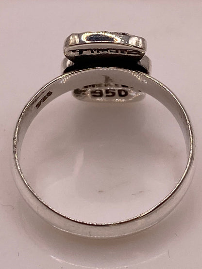 Anillo en Plata Ley 950 con Ópalo de Fuego Diseño con Figura de Cruz, sello de autenticidad Plata Ley .925