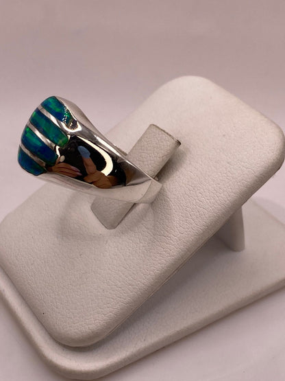 Anillo en Plata Ley 950 con Ópalo de Fuego Diseño Ovalado Segmentado, vista frontal