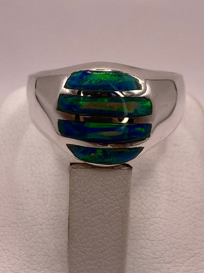 Anillo en Plata Ley 950 con Ópalo de Fuego Diseño Ovalado Segmentado, sello de autenticidad Plata Ley .925