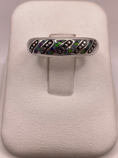 Anillo de Plata Ley 950 con Ópalo de Fuego Multicolor en báscula mostrando peso