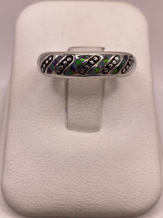 Anillo de Plata Ley 950 con Ópalo de Fuego Multicolor en báscula mostrando peso