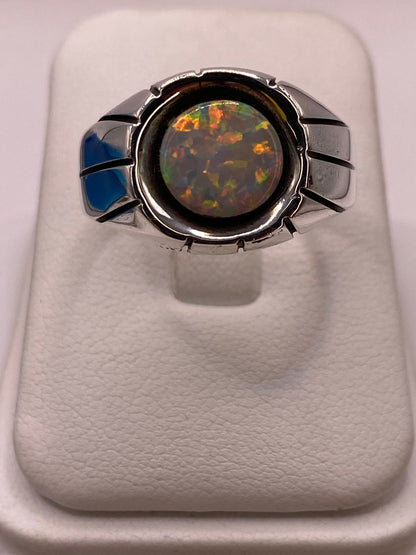 Anillo Plata Ley 950 con Piedra Ópalo de Fuego en báscula mostrando peso