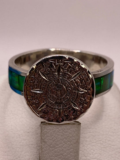 Anillo Plata Ley 950 con Piedra Ópalo de Fuego y Diseño de Calendario Azteca, vista superior