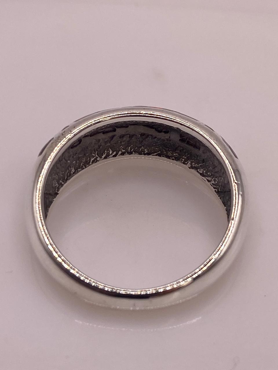 Anillo de Plata 950 con Ópalo de Fuego y Diseño Greca, sello de autenticidad Plata Ley .925