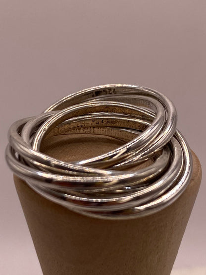 Anillo Semanario de 7 Aros Entrelazados en Plata .925, sello de autenticidad Plata Ley .925
